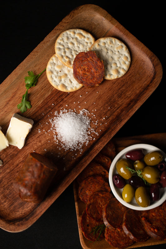 Spanish chorizo on wood charcuterie board